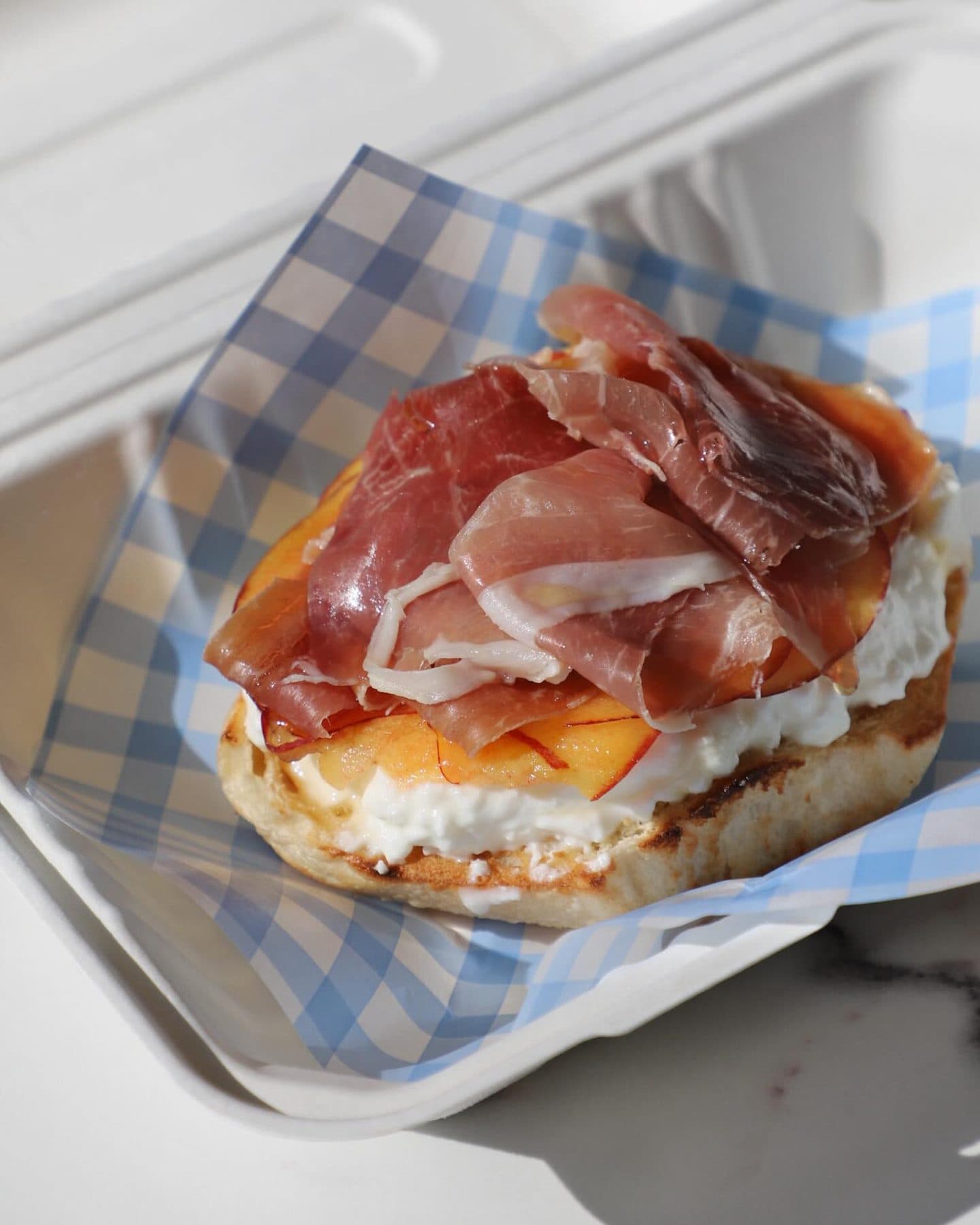 The Jersey Peach bagel with prosciutto, peach and cottage cheese